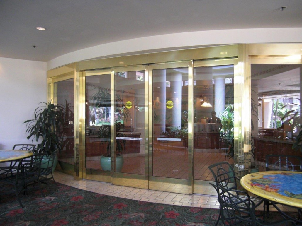 automated double doors with gold frame