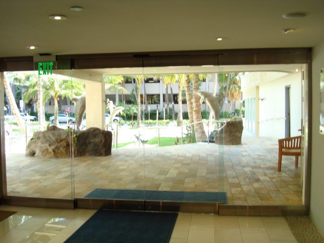 All Glass Bi-parting door package with no vertical rails